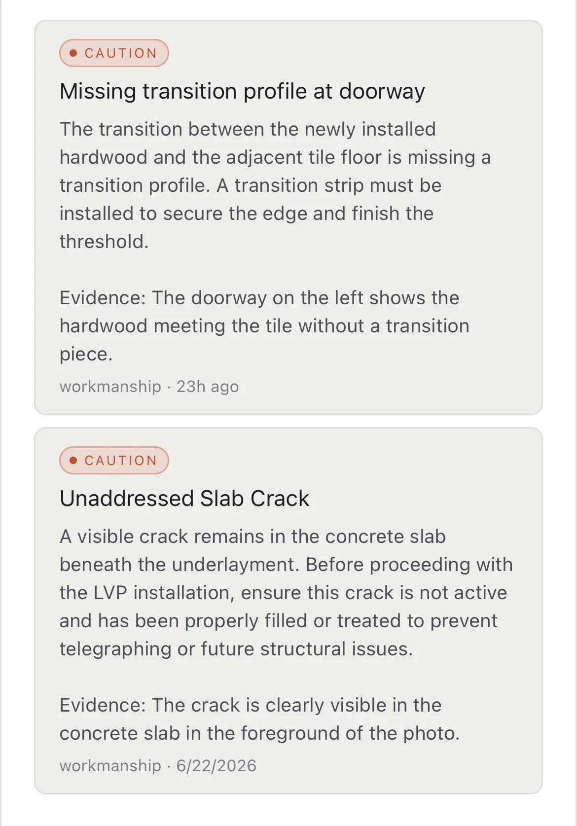 Two graded findings on a flooring job: a caution for a missing transition profile where new hardwood meets tile at a doorway, and a caution for an unaddressed slab crack under the underlayment — each with the requirement behind it and the evidence visible in the photo.